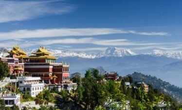 Nagarkot view featuring a monastery (gumba) with scenic Himalayan landscape